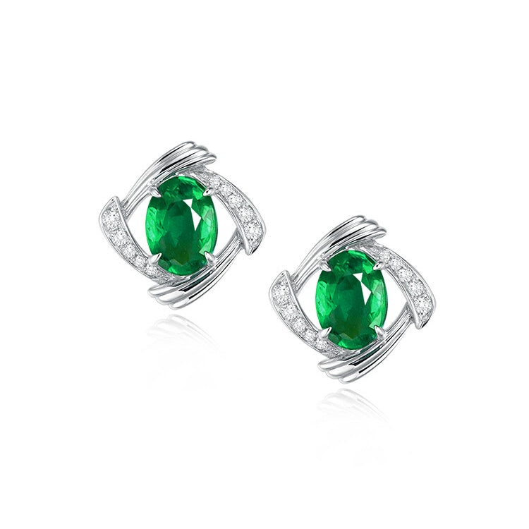 Oval Emerald And Diamond Stud Earrings - image 1