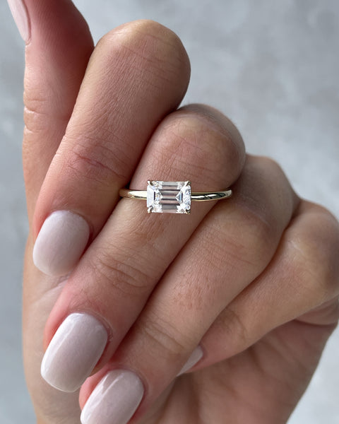 East West Emerald Solitaire Engagement Ring - image 2