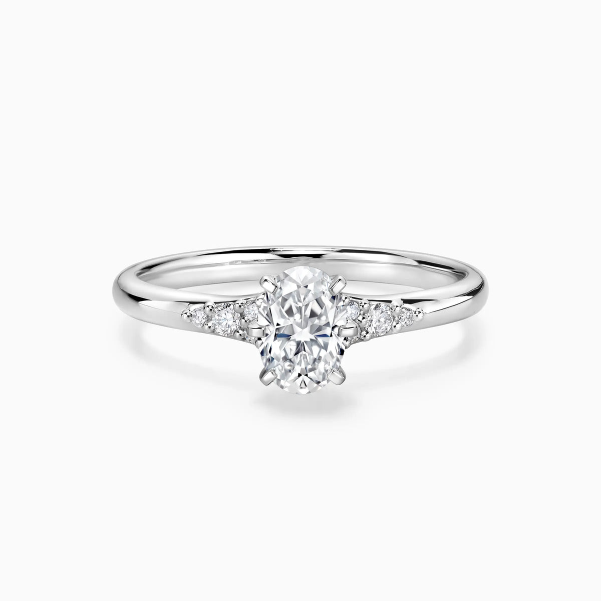 Oval Cut Lab Grown Diamond Side-stone Engagement Ring - image 1